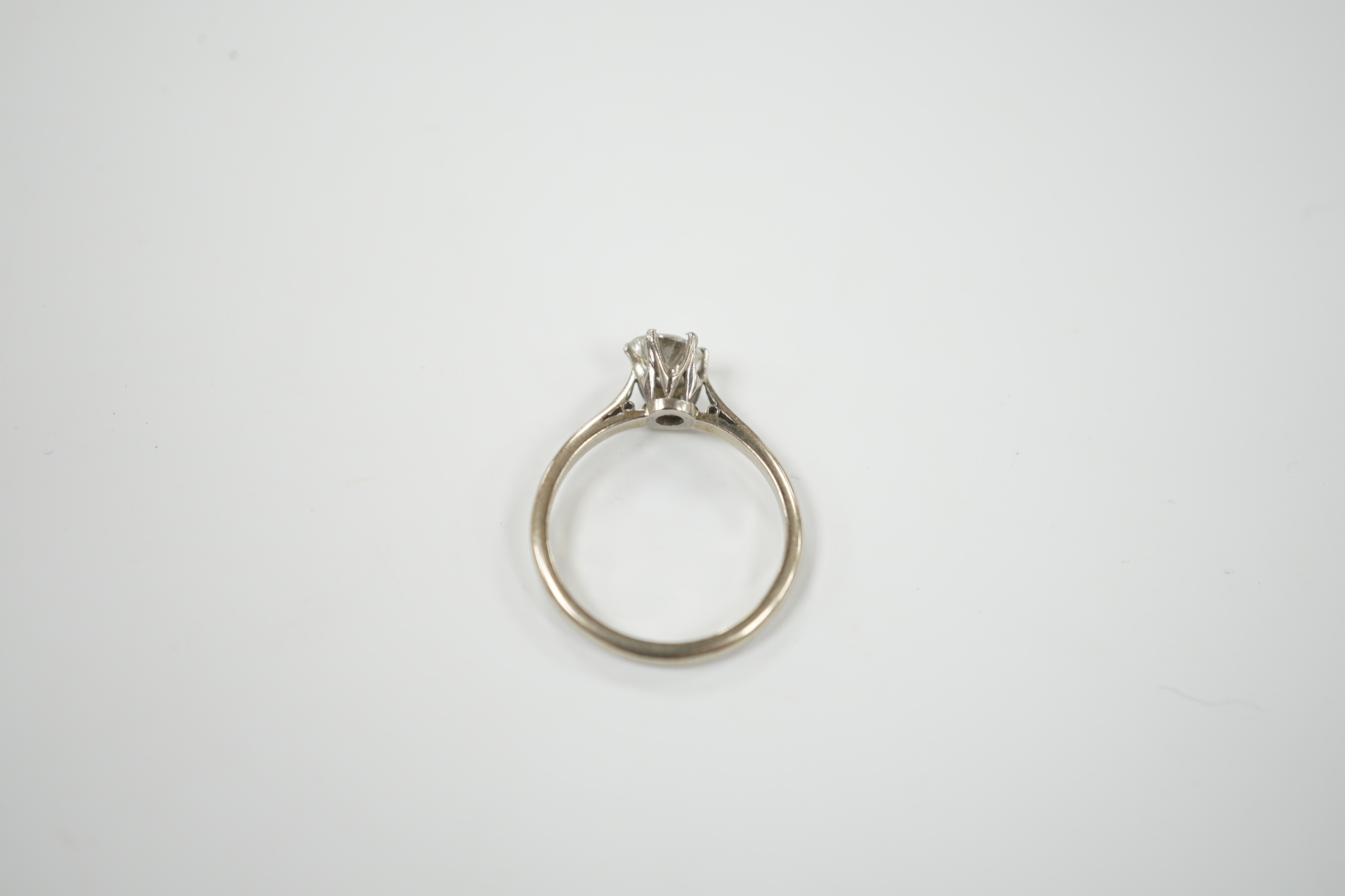 An 18ct and solitaire diamond set ring, size M, gross weight 1.9 grams, the stone diameter 5.5mm.